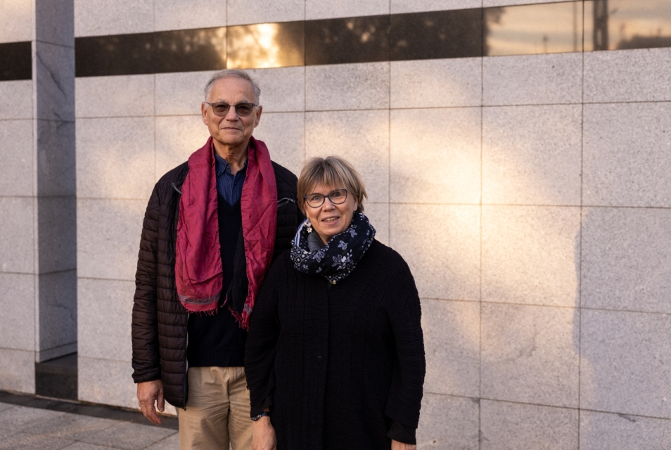 Ewa Teleżyńska-Sawicka and Paweł Sawicki stand at the Umschglagplatz monument.