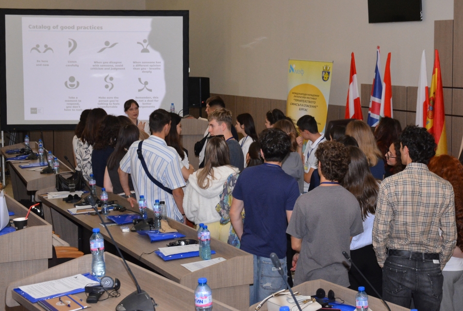 Alef competition laureates during a meeting in some room.