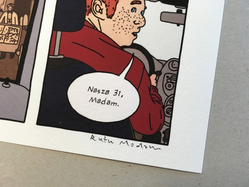 Fragment komiksu. Rudy mężczyzna z piegami prowadzi samochód. Poniżej znajduje się dymek z jego wypowiedzią: "Nasza 31, Madam".