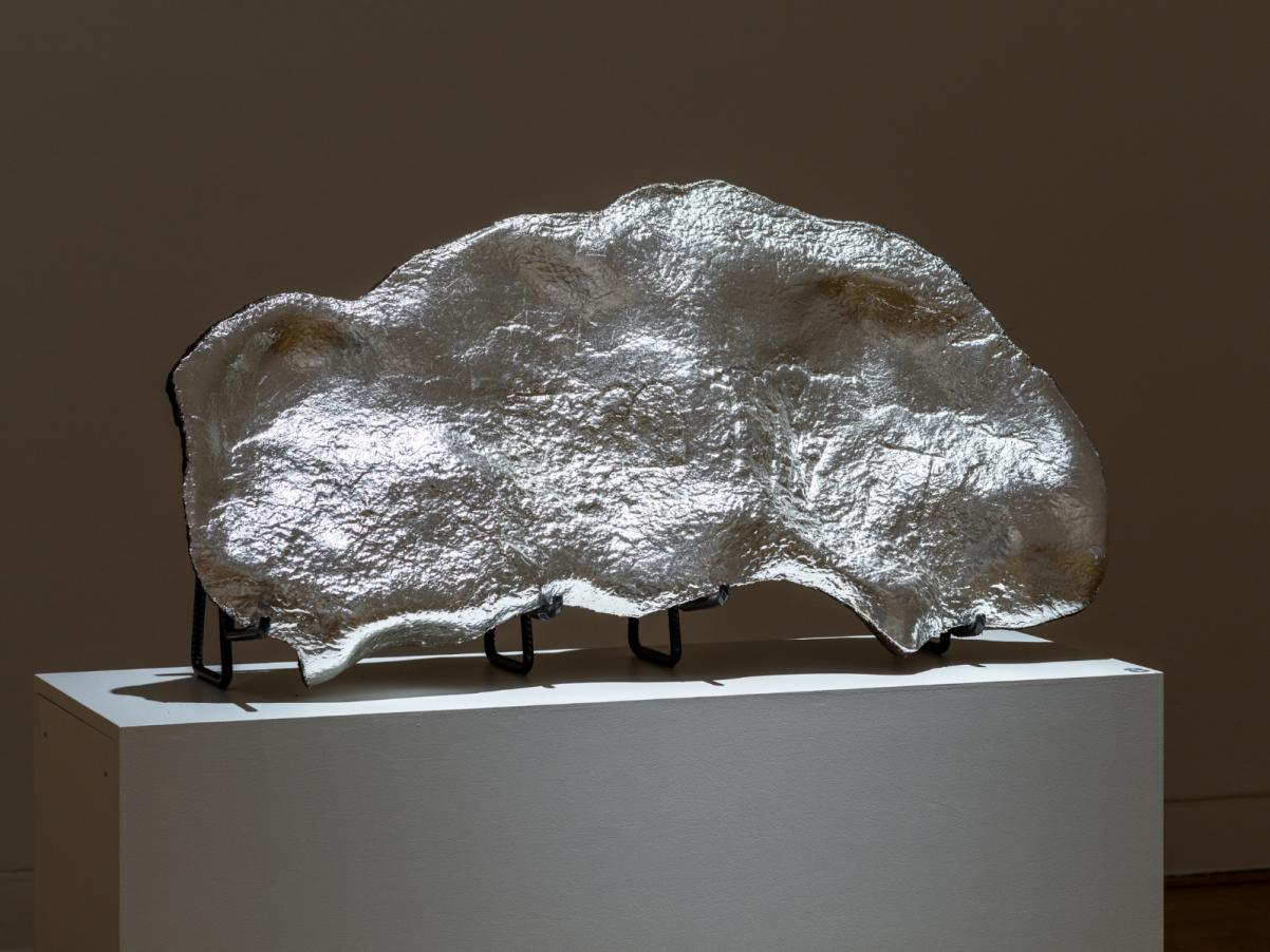 A silver object from Hideouts exhibition by Natalia Romik.